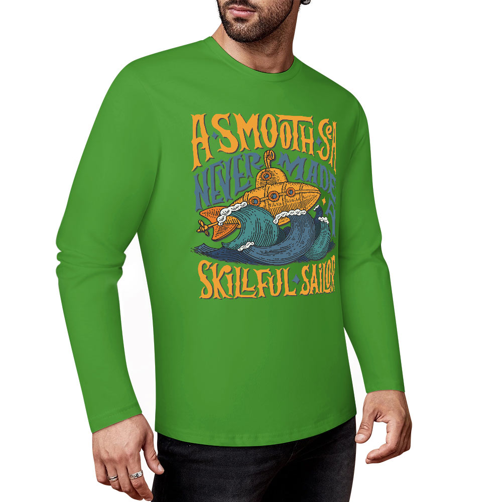 Green pure cotton long sleeve T-shirt with ASMODUS Shark Attack graphic, perfect for casual wear.