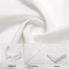 Close-up of white polyester fabric, highlighting texture and quality. Vintage shirt material.