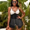 Black Split Skirt Mesh Swimsuit Set with white floral accents, perfect for beach and vacation