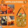 Halloween tote bag with ghost and pumpkin pattern, ideal for candy and party favors.