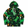 Youth all over print hoodie with green dinosaur pattern, featuring a hood and drawstring.
