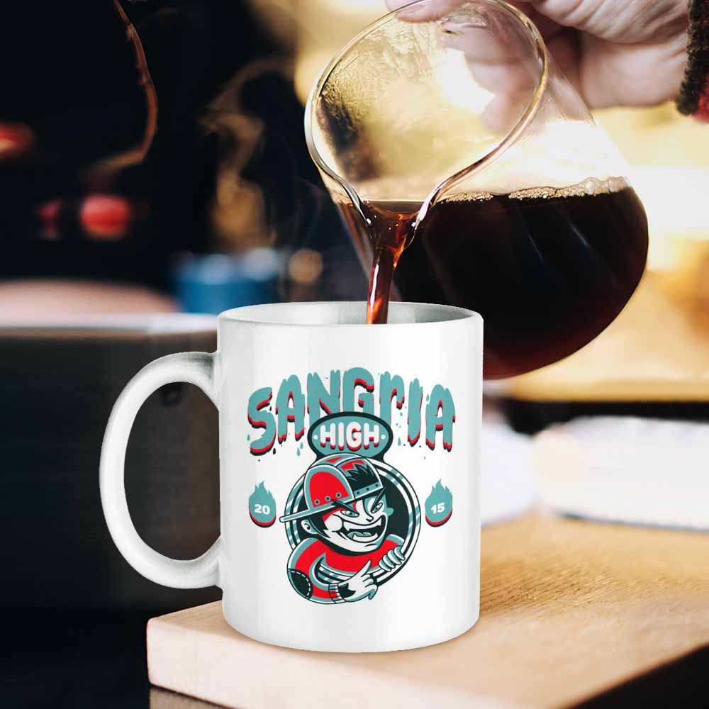White ceramic SANGRIA mug, coffee being poured, perfect for cafe and home use.