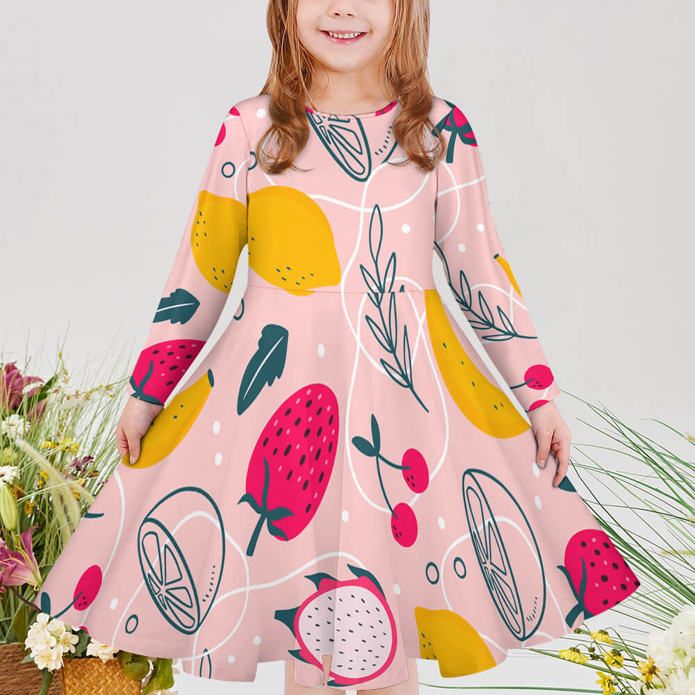Girls' pink long sleeve dress with fruit pattern. Soft, comfortable polyester-spandex blend.