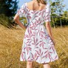 Sweetheart dress featuring floral print and short sleeves, perfect for casual wear, showcasing the back and dress details.
