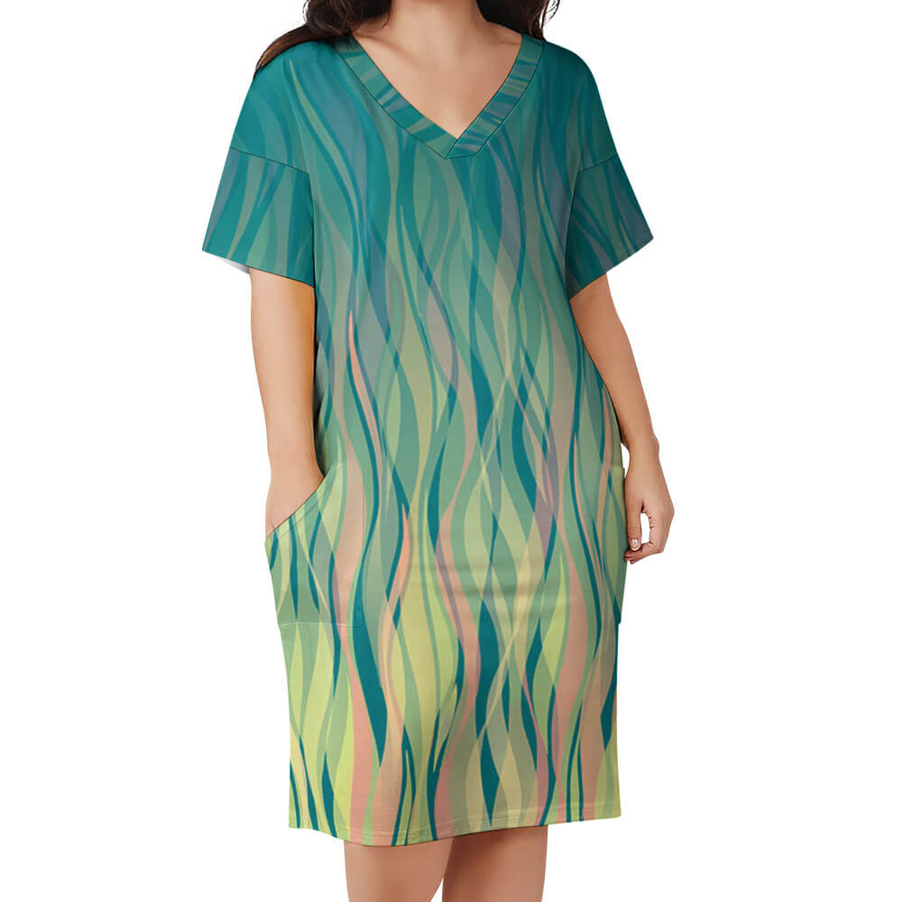 Green imitation cotton loose pocket dress with V-neck and patterned design, perfect for everyday wear.