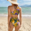 Yellow floral one-shoulder bikini swimsuit with high-waisted bottoms, perfect for beach vacations.