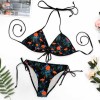 Floral bikini swimsuit with adjustable straps and side ties, perfect for beach or pool