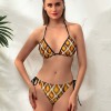 Yellow geometric patterned bikini swimwear with adjustable straps, perfect for beach or pool activities.