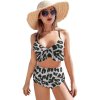 Sexy two-piece bikini swimsuit with leopard print and high-waisted bottoms, perfect for beach parties.