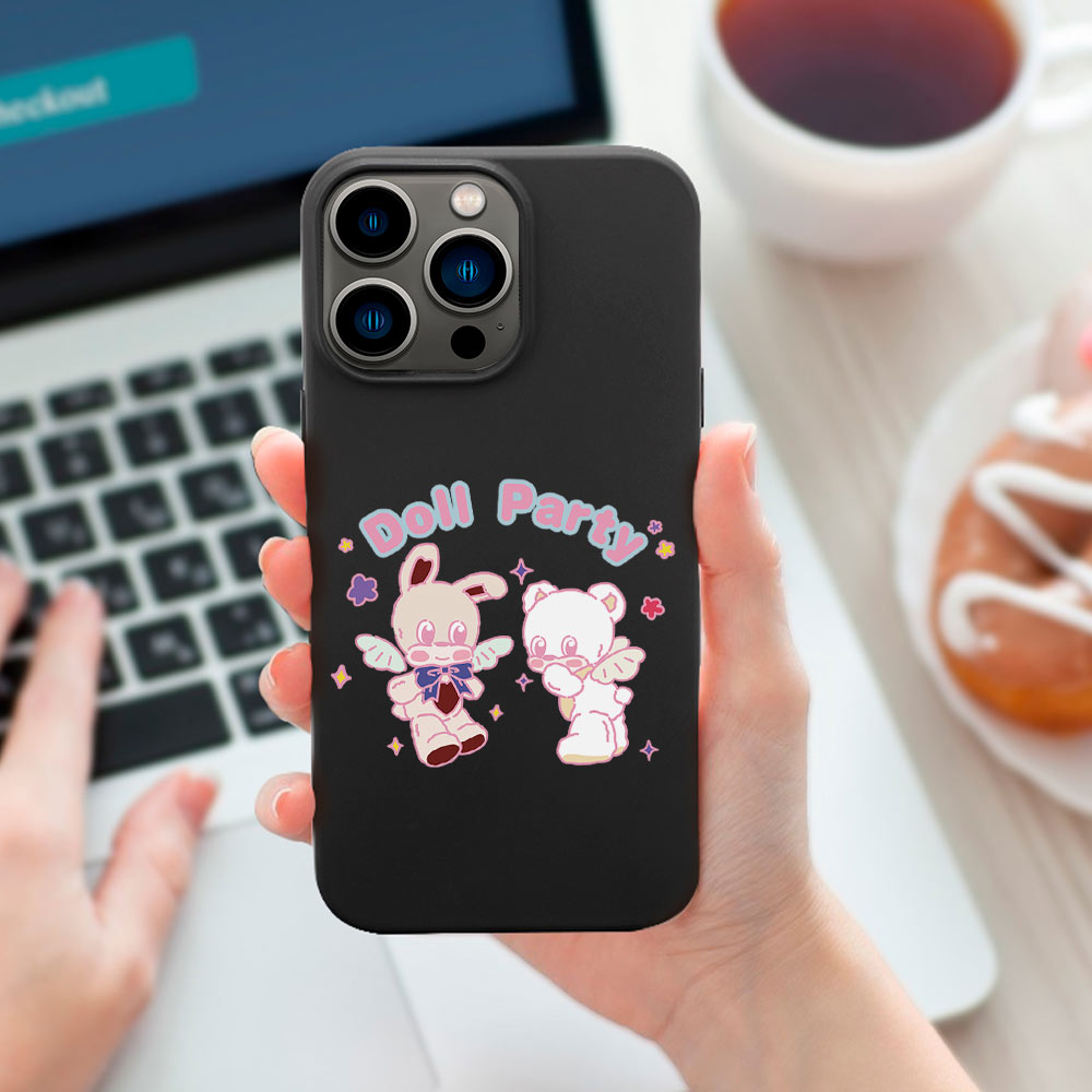 iPhone 13 case with black TPU, "Doll Party" design featuring bunny and bear characters, wireless charging compatible.