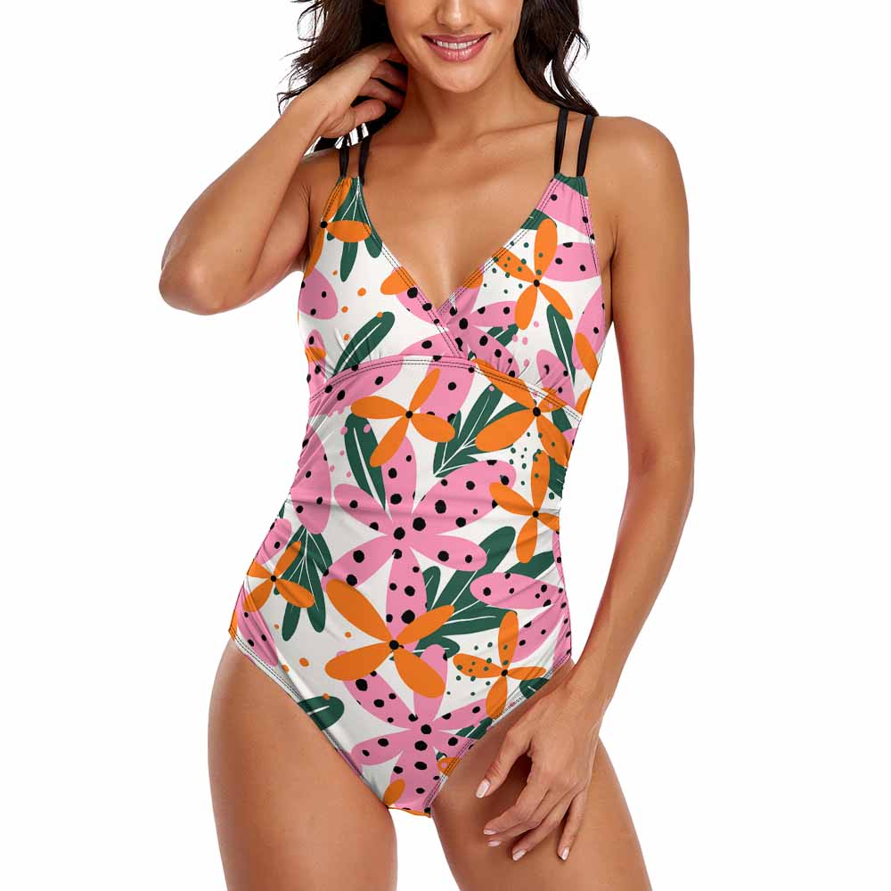 Floral one-piece swimsuit with double shoulder straps, perfect for summer beach wear.