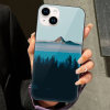 iPhone 14 glass case with mountain and water landscape design, combining protection and style