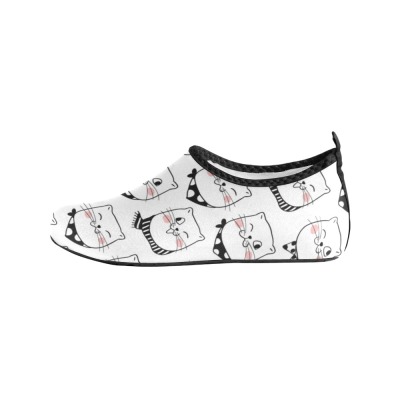 Women's white canvas aqua shoes with black pattern, perfect for water activities and leisure.
