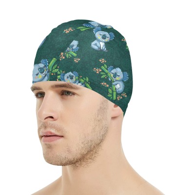Green floral swimming cap on a man, breathable polyester-spandex blend, suitable for swimming