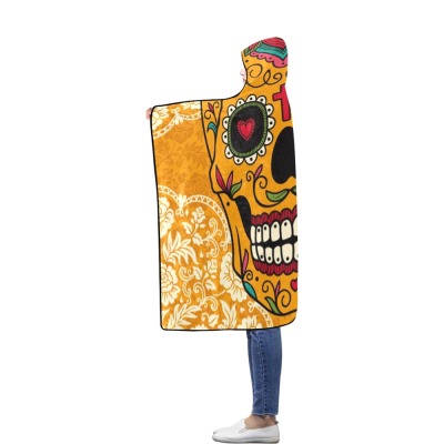 Flannel hooded blanket with sugar skull design, perfect for indoor and outdoor use