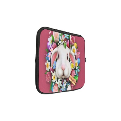 Pink 13 inch laptop sleeve with white bunny and floral design. Water-resistant neoprene.
