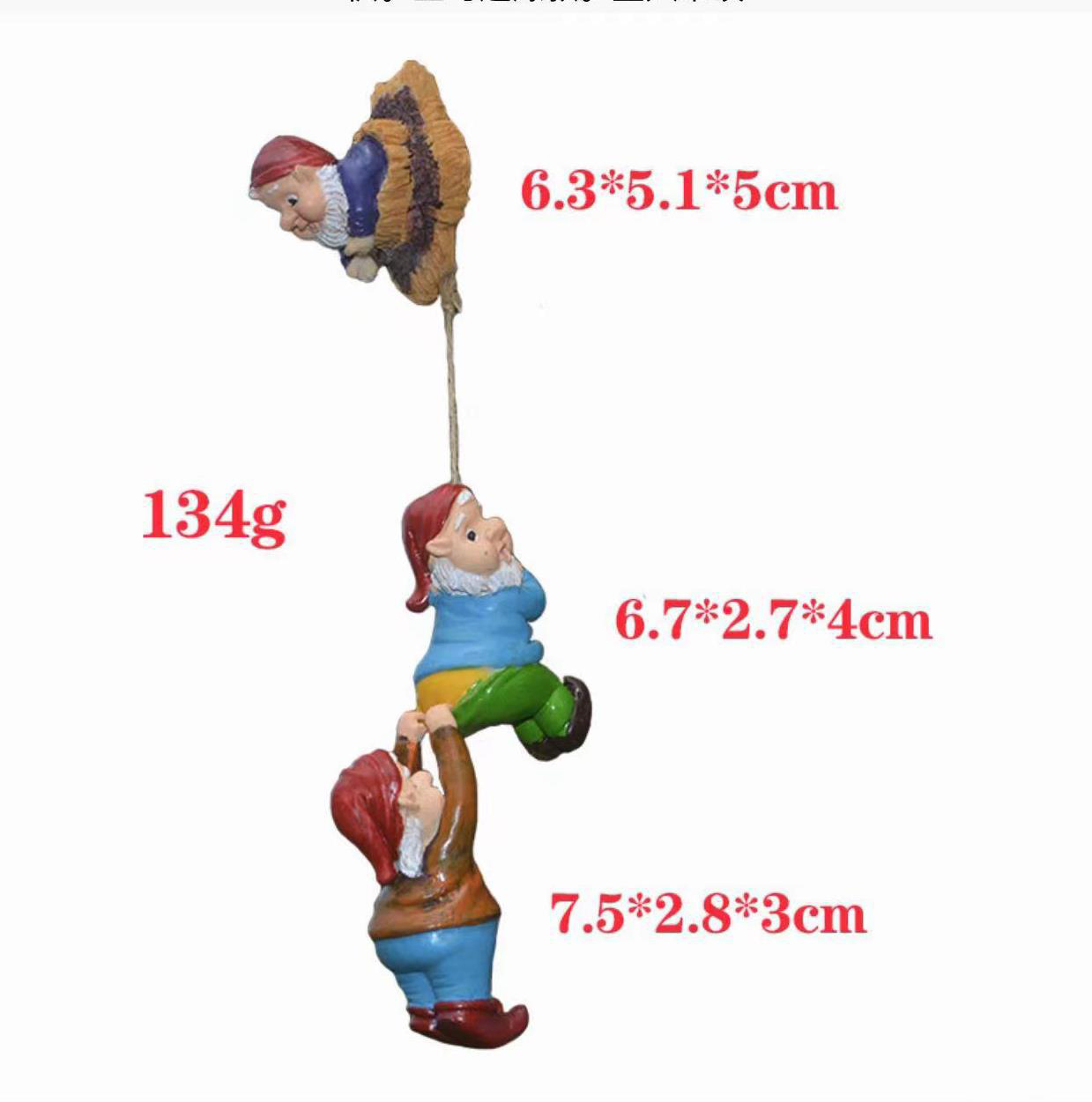 Resin gnome climbing set displayed in a garden setting