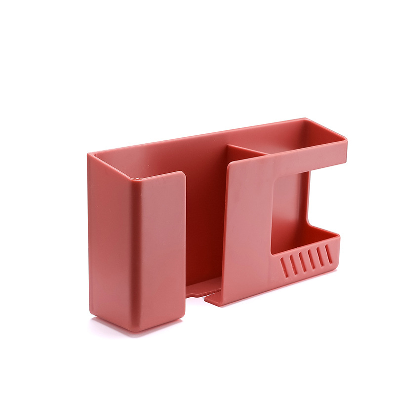 Terracotta wall caddy shown from an angle, showing slot depth and open compartments