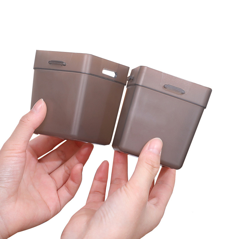 Household items spread loose across a shelf before being sorted