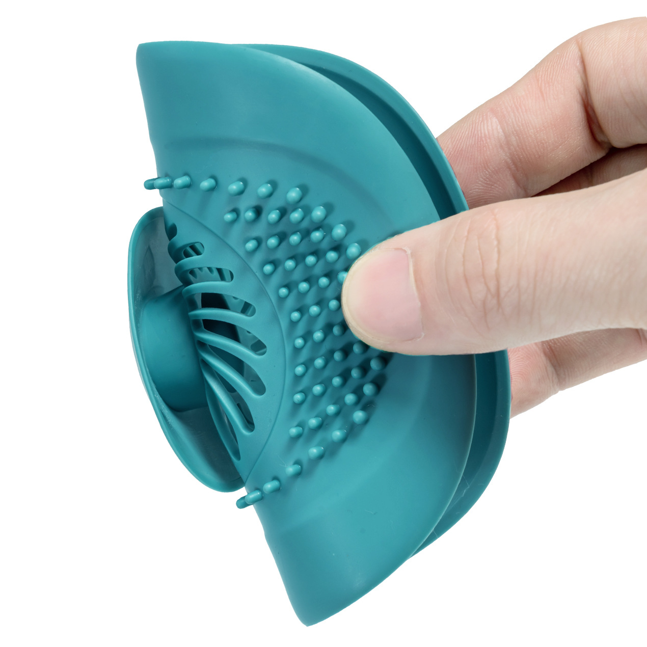 Close view of raised silicone nub ring on a teal drain cover