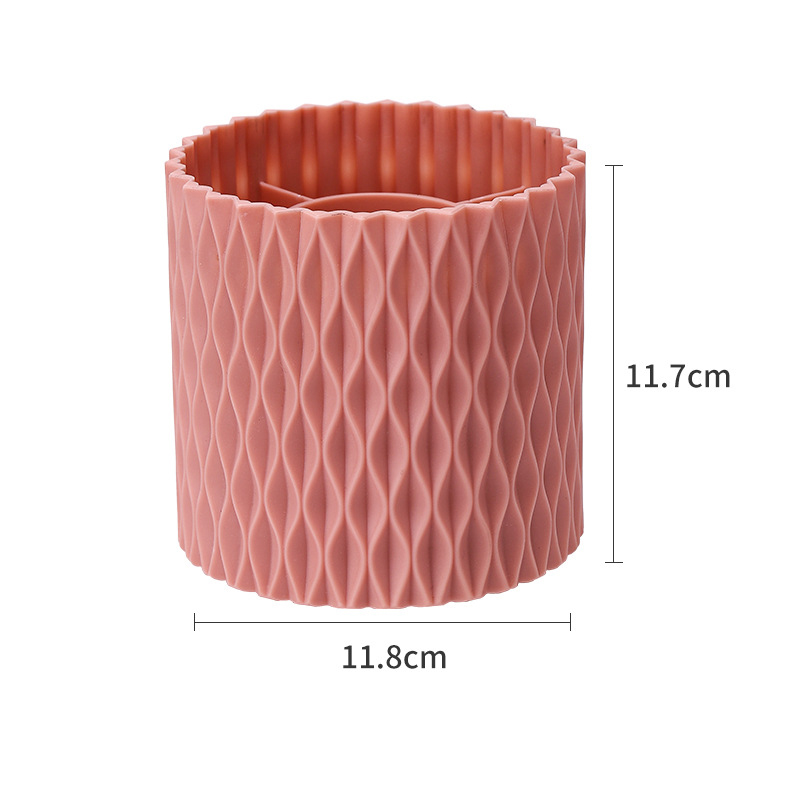 Close view of the matte wave-textured wall of a cylindrical storage holder