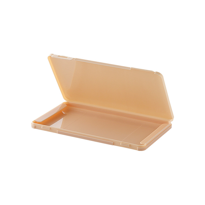 Disposable masks loose in a bag beside keys and tissues