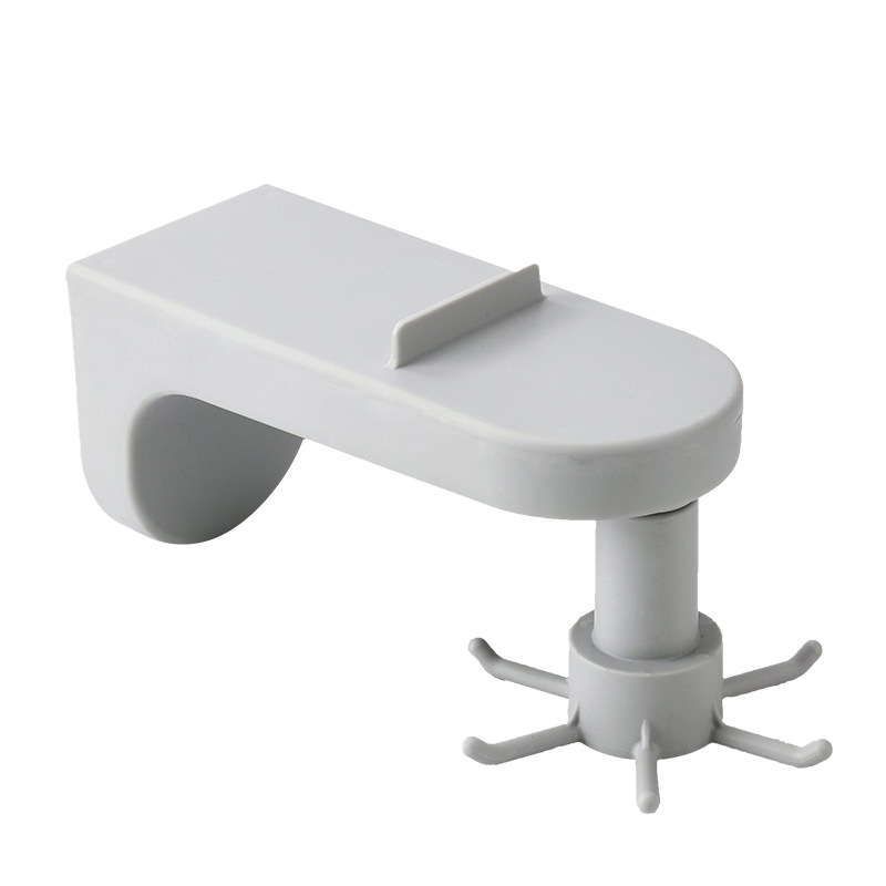 Matching white and black rotating racks with plates and hooks laid out together
