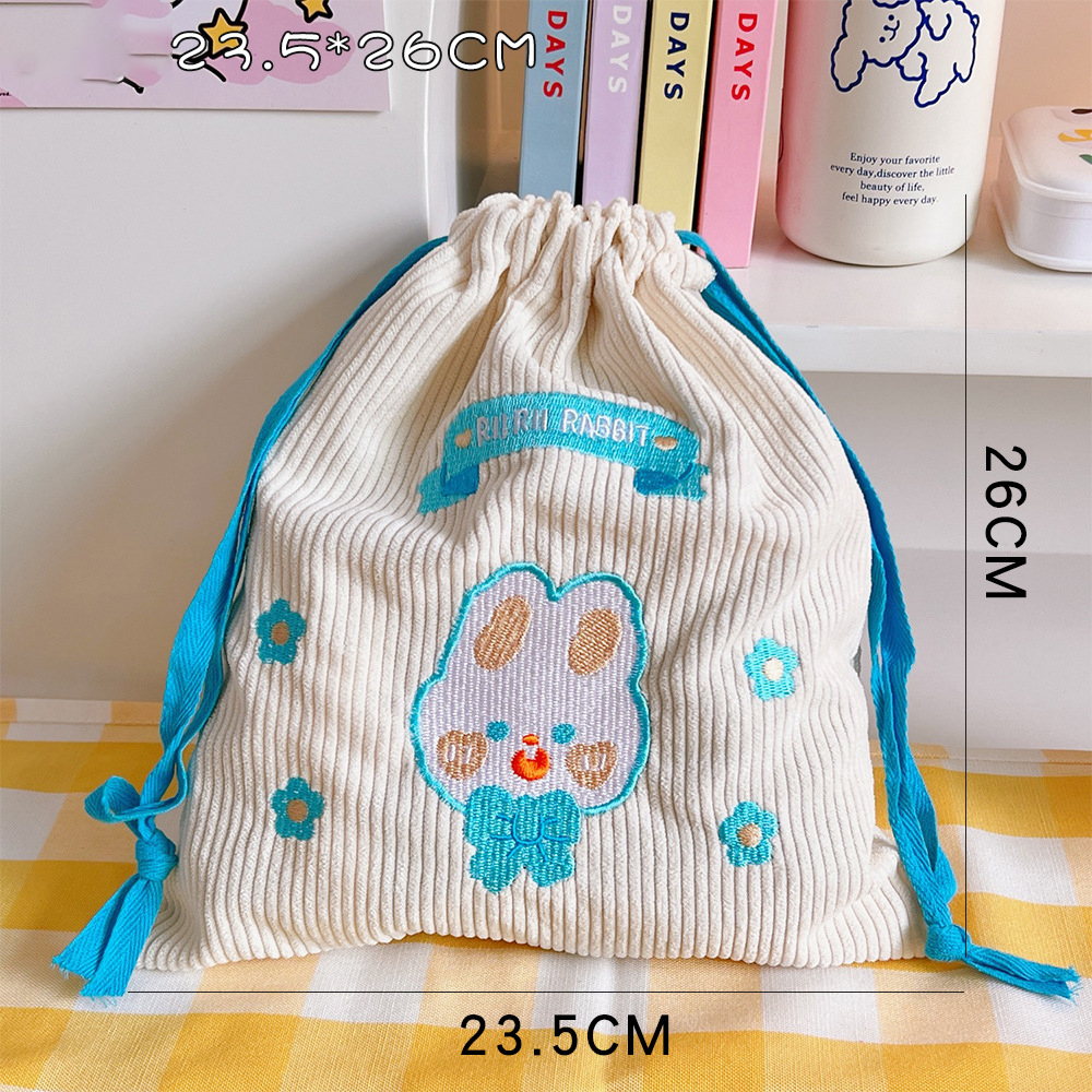 Corduroy drawstring pouch with cord gathered at the top
