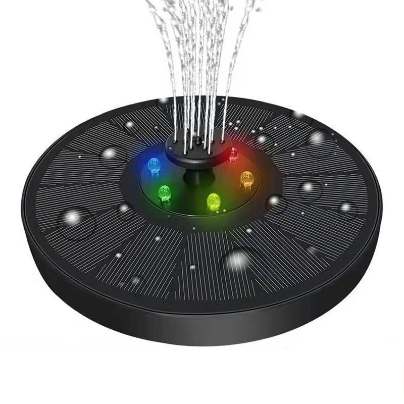Solar panel on top of a black floating fountain disc in daylight