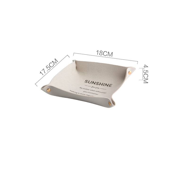 Cream desk tray shown with its width and height measured