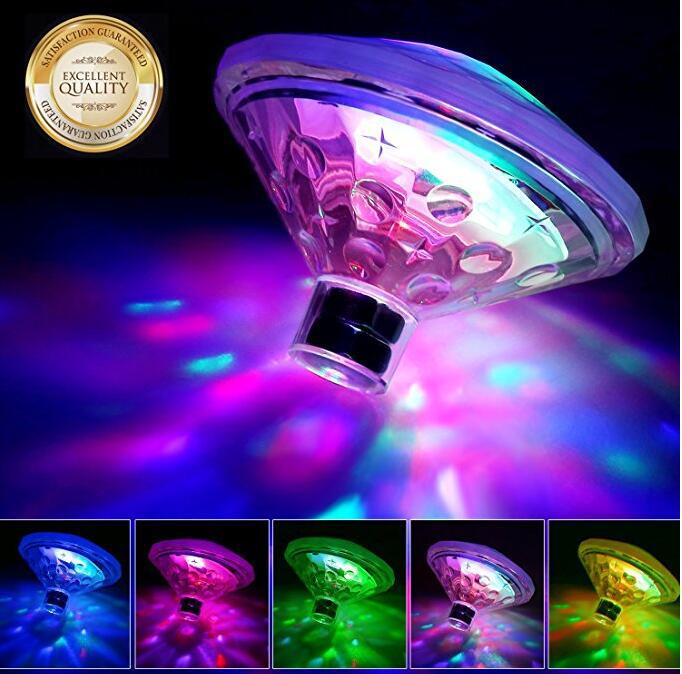 Diamond light floating in dark water with blue and pink patterns
