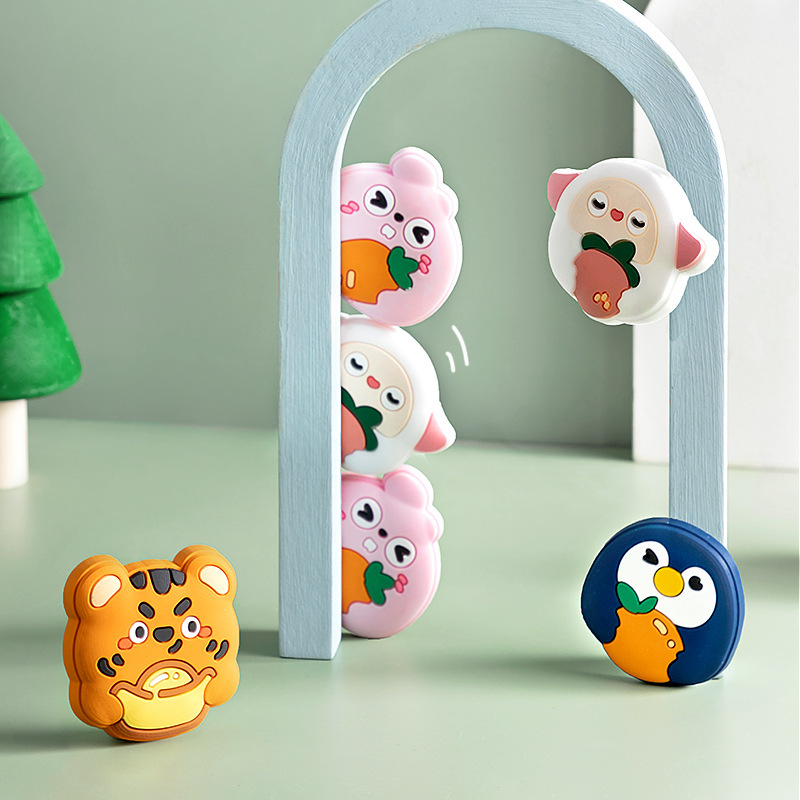 Pink pig, white sheep, tiger and penguin pads displayed as a set