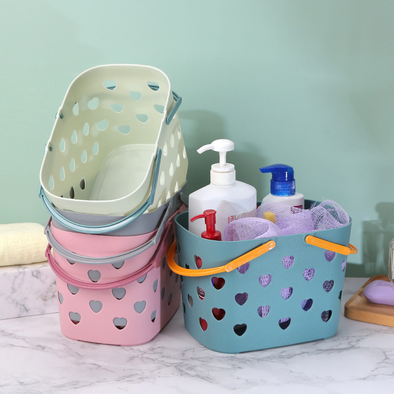Teal tote with orange handles shown beside other colourways