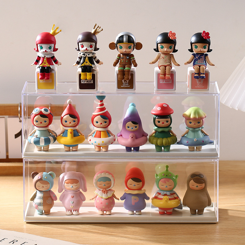 Blind box figures in a loose pile before they are put on display