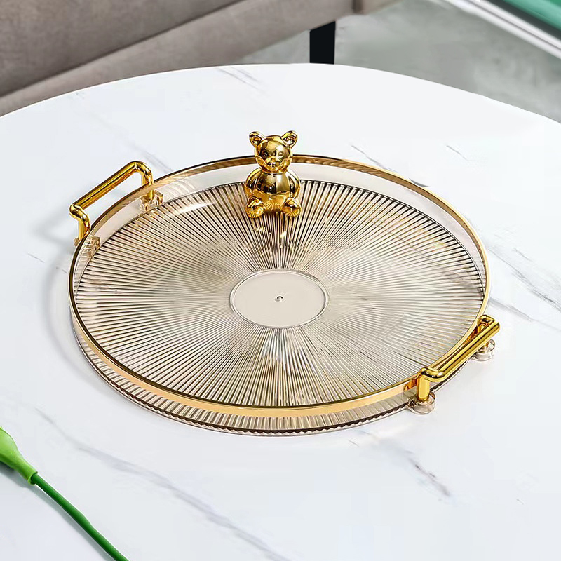 Amber champagne tray with ribbed sunburst base and gold rim