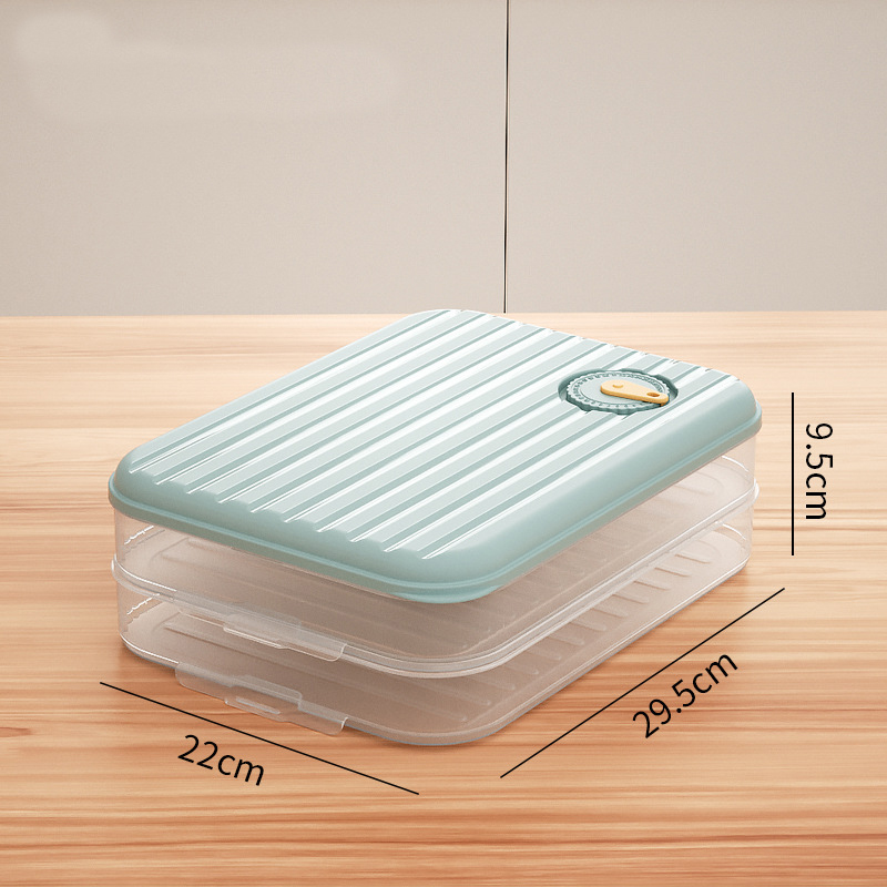Mint teal dumpling storage box shown in matching size