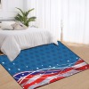 American flag area rug with black binding, wave pattern, blue background, for living room.