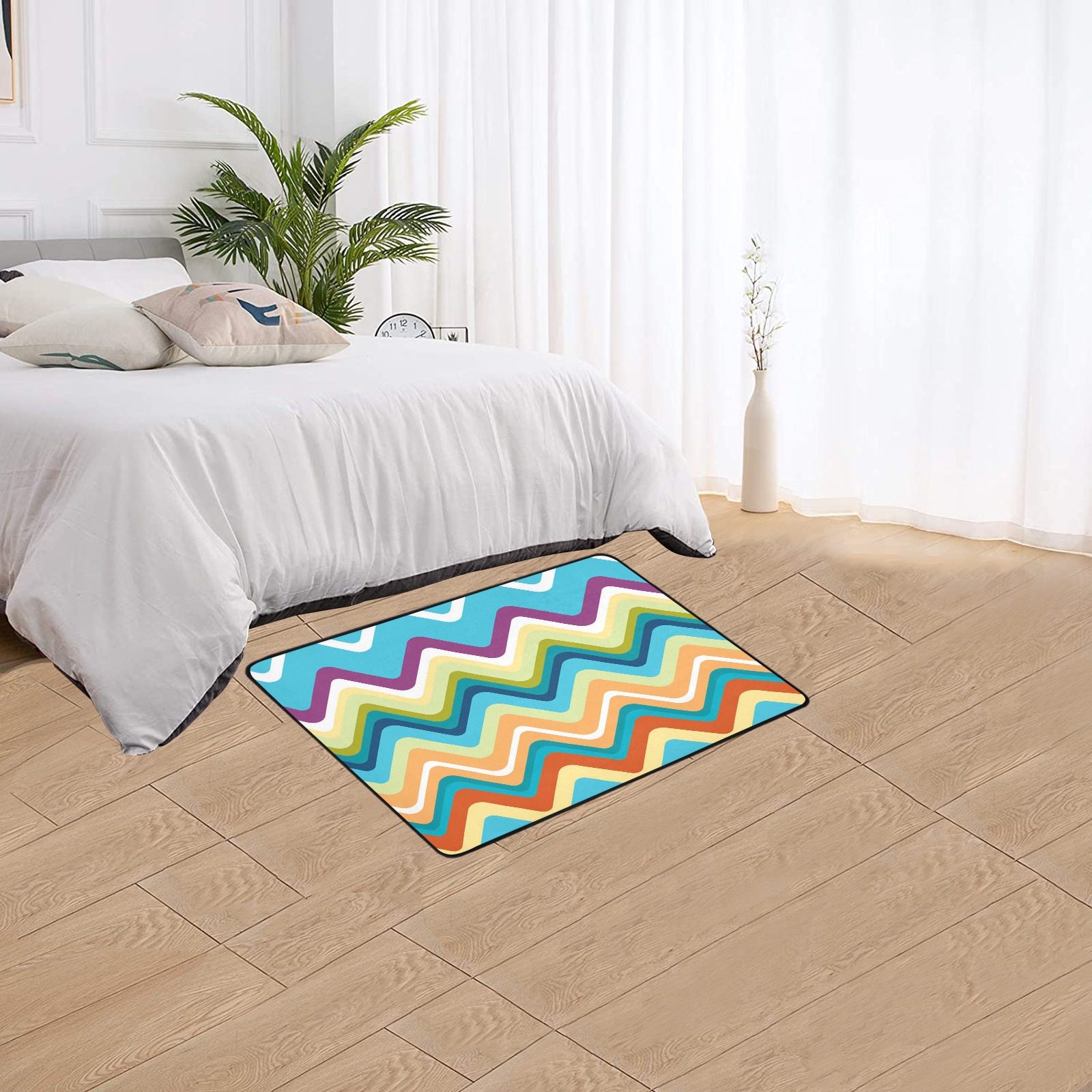 Area rug with chevron pattern in a bedroom setting, vibrant colors, polyester material, machine washable, custom design.