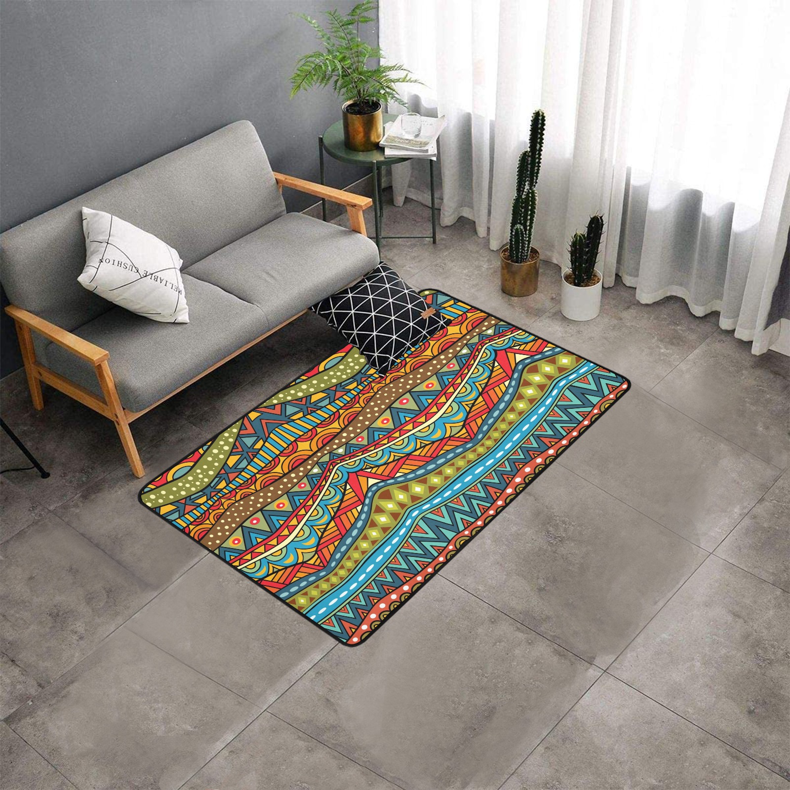 Area rug with black binding, featuring colorful wavy patterns, placed in a living room setting