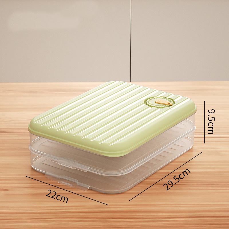 Pale green dumpling storage box with ribbed matte-glossy lid