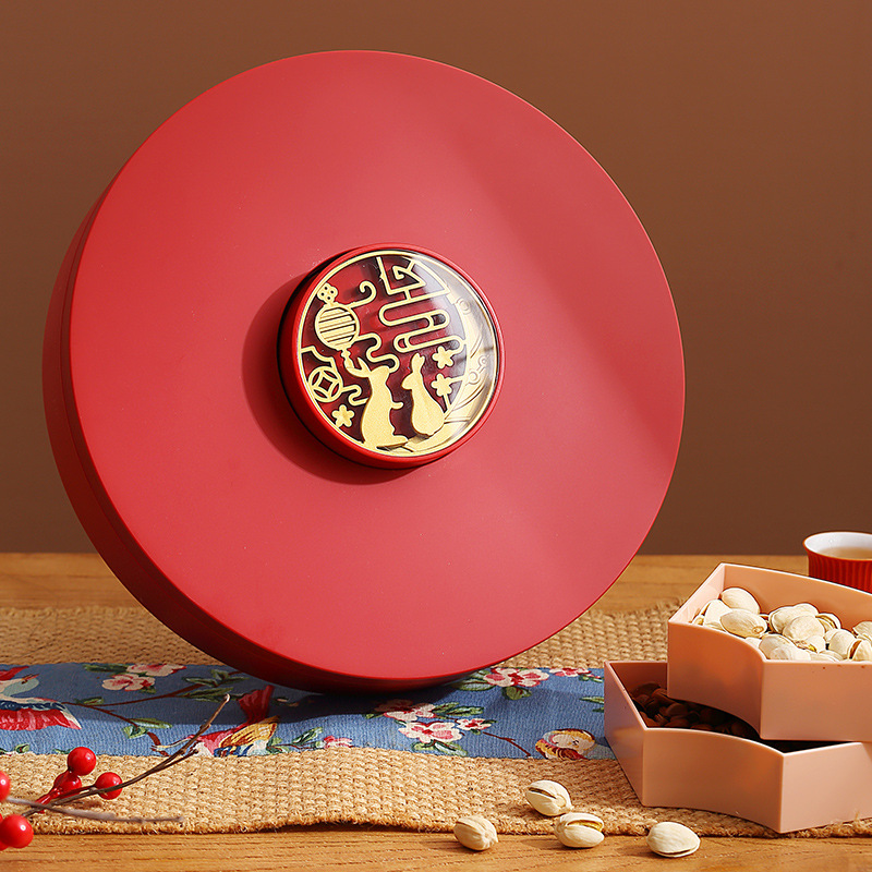 Red snack tray with sectioned compartments ready for holiday guests