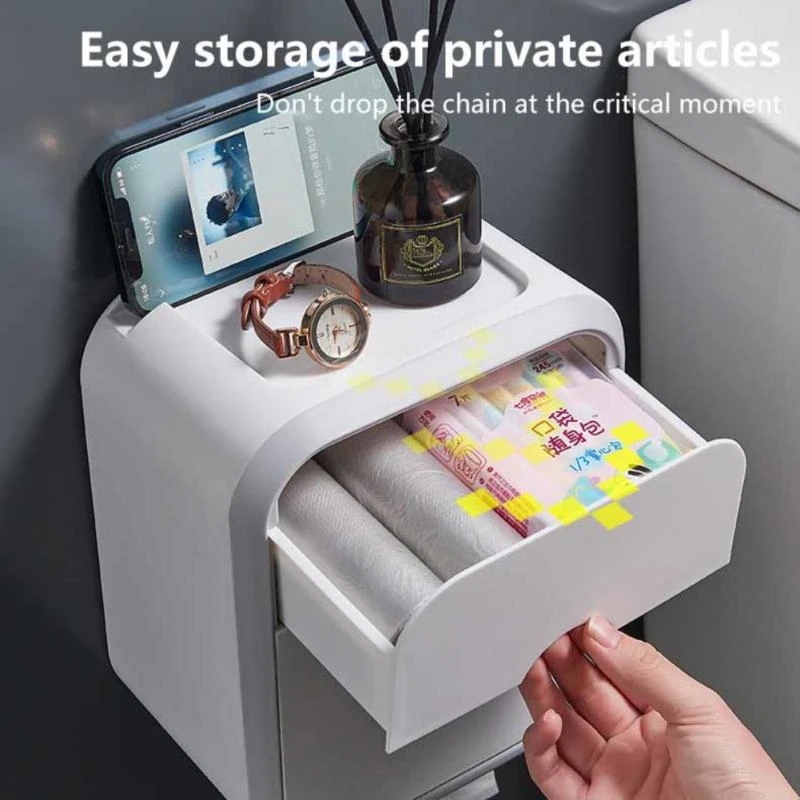 Front drawer and top shelf holding personal items on a bathroom wall
