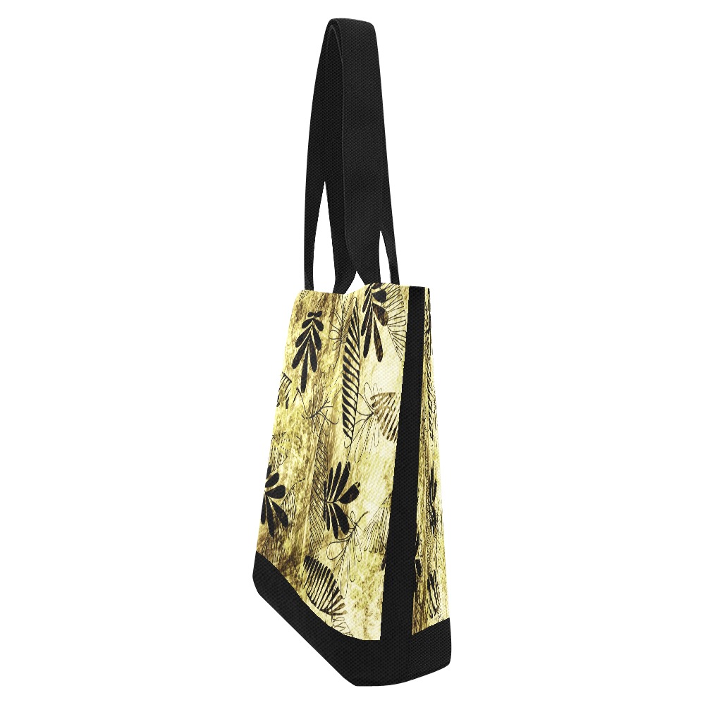 Beige canvas tote bag (Model 1657) side view, black floral pattern, black handles, shopping tote.