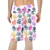 Men's relaxed-fit shorts with all-over colorful paw print design, made of polyester-spandex blend.