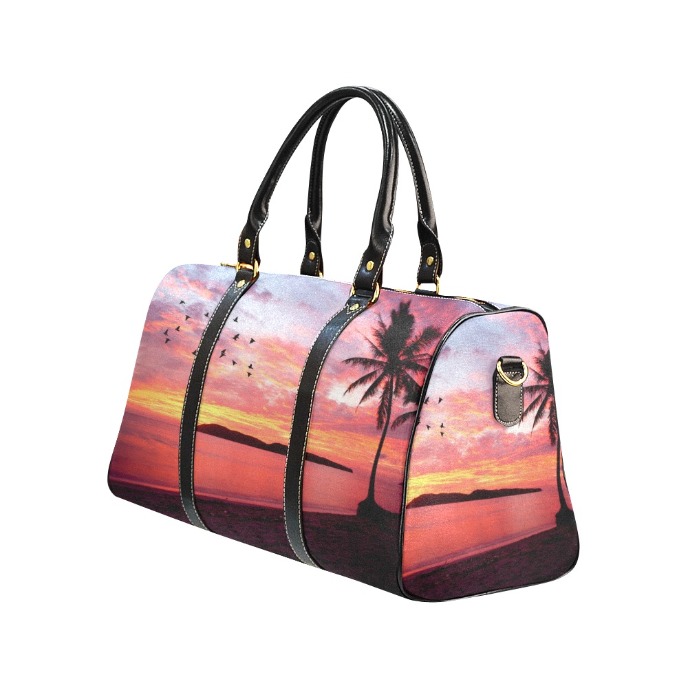 Black travel bag with sunset palm tree design, waterproof fabric, ideal for travel and outdoor activities.