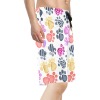 Men's relaxed-fit shorts with colorful paw print design. Polyester-spandex blend.