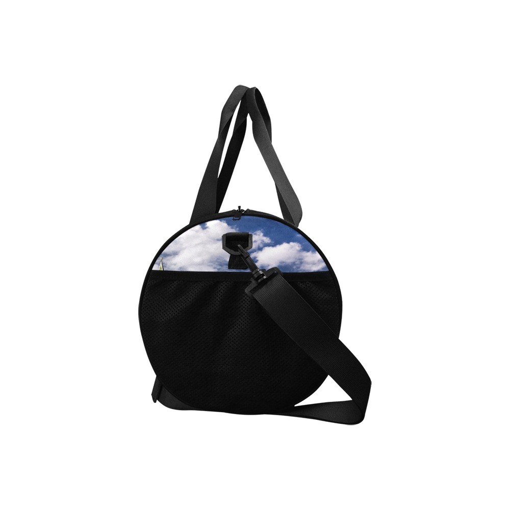 Model 1679 Travel Duffel Bag with cloud print, adjustable strap, water-resistant, perfect for travel and outdoor activities.