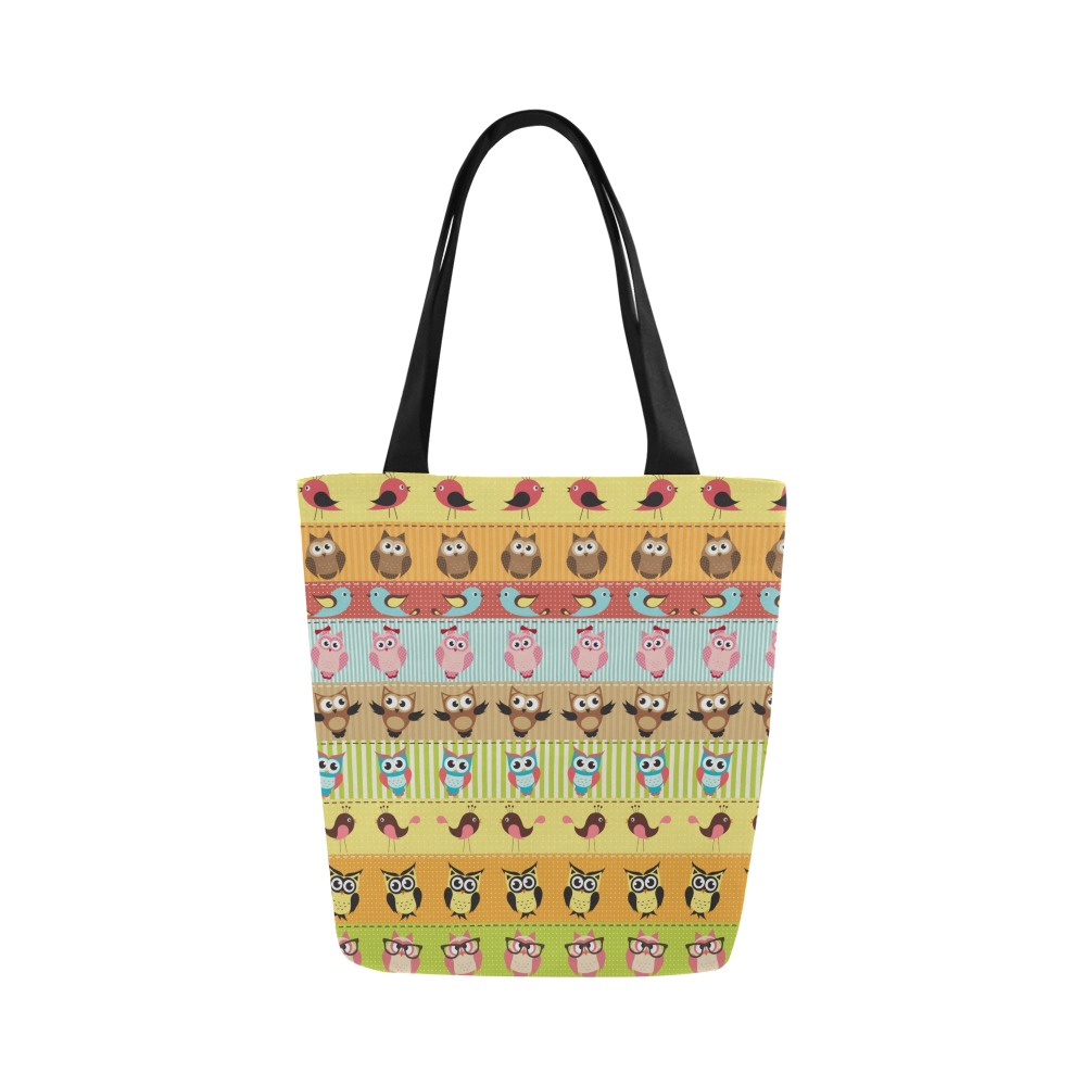 Canvas tote bag with colorful pattern, black handles, ideal for shopping or travel. Inkedjoy tote bag.