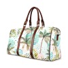 Brown travel bag featuring a tropical pattern with palm trees, brown handles. Waterproof, durable and perfect for travel.