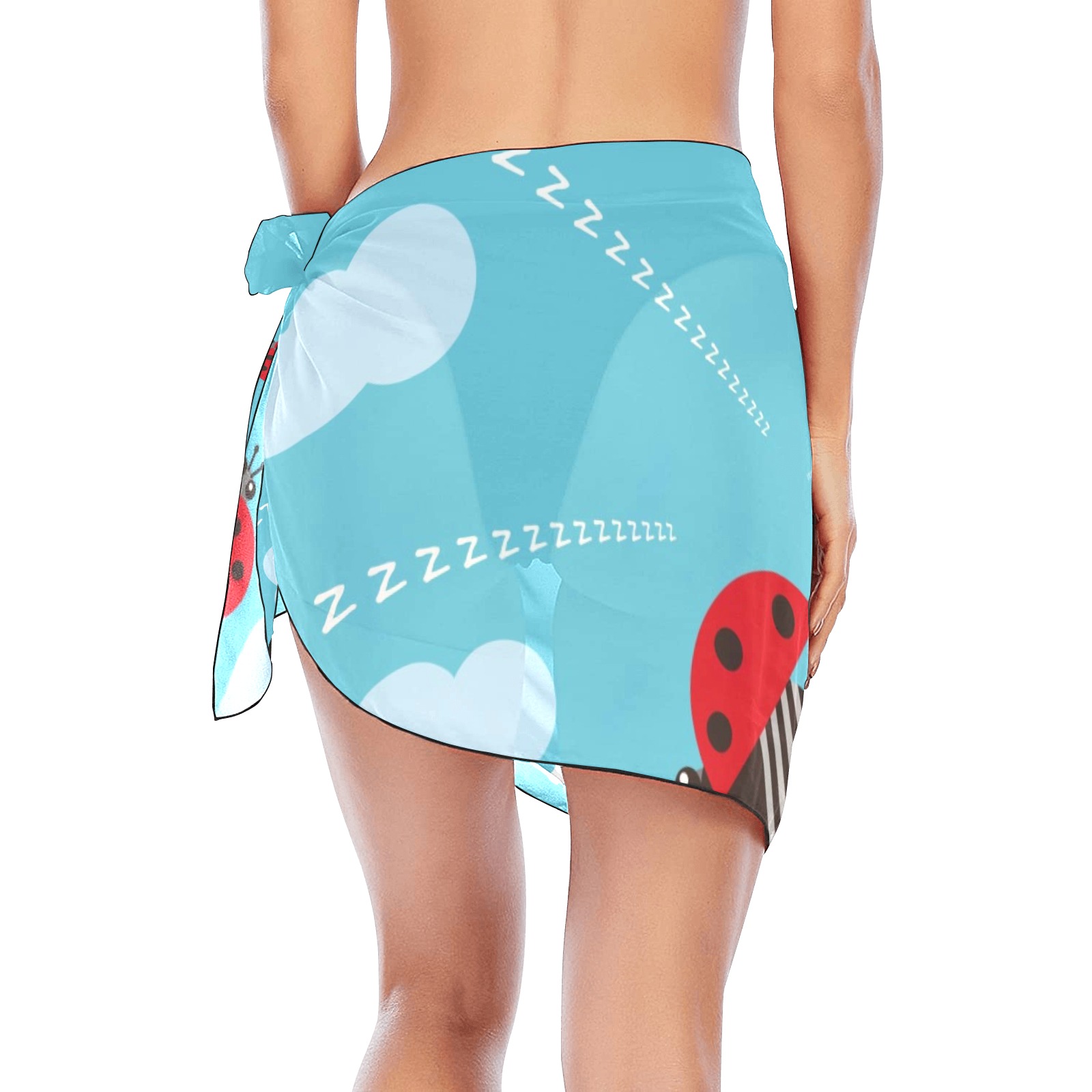 Women's blue sarong wrap with ladybug and cloud print, perfect beach cover-up